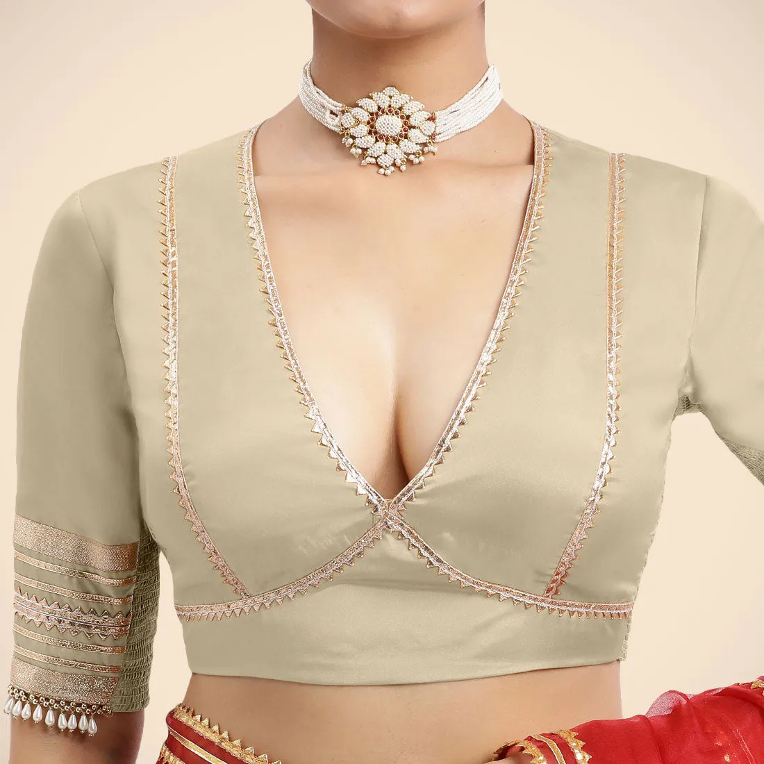 Nafeeza x Tyohaar | Cream Embellished Elbow Sleeves FlexiFit™ Saree Blouse with Plunging V Neckline with Tasteful Golden Gota Lace